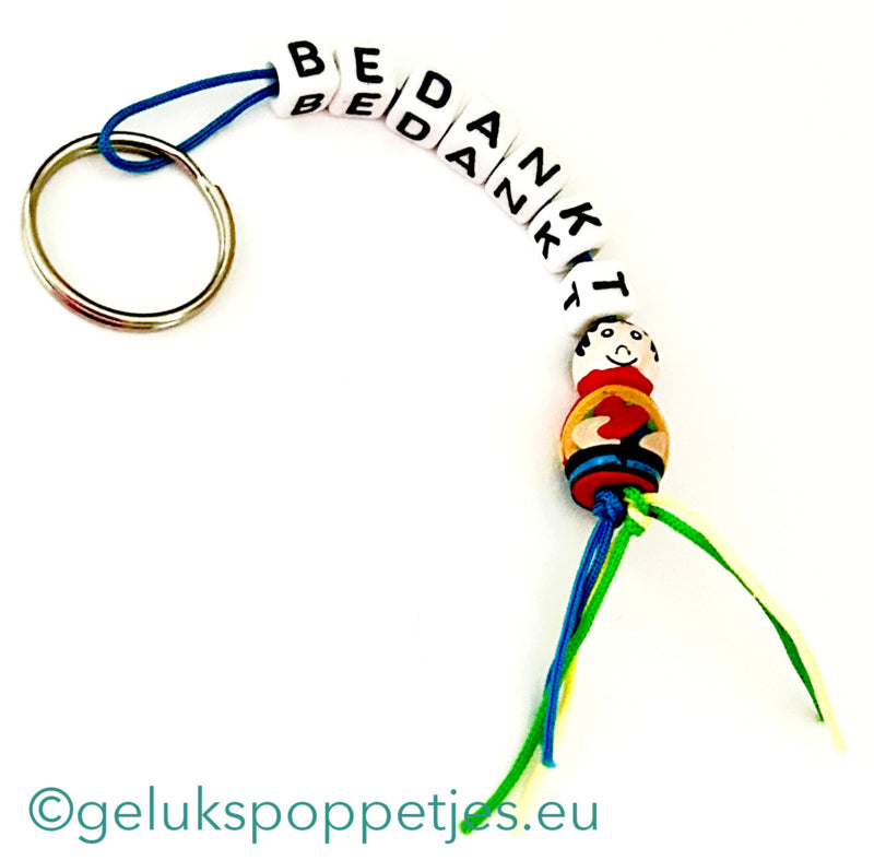 Sleutelhanger bedankt met regenboog gelukspoppetje