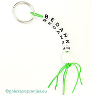 Bedankt sleutelhanger met gelukspoppetje golfbal