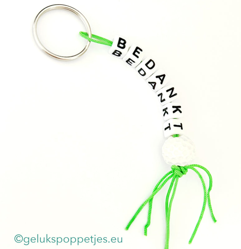 Bedankt sleutelhanger met gelukspoppetje golfbal
