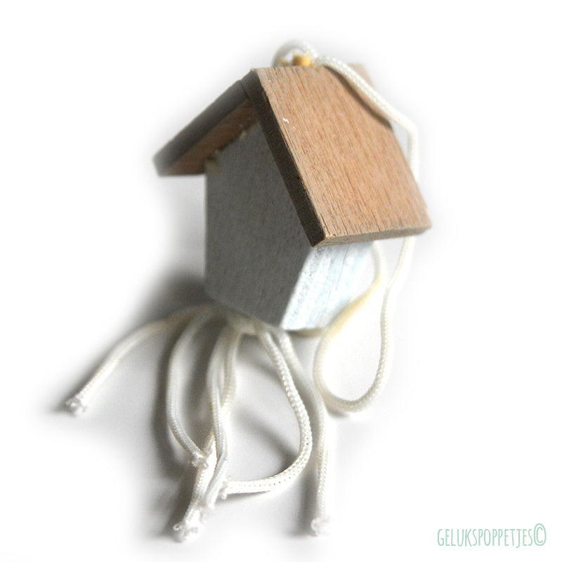 Gelukspoppetje huisje