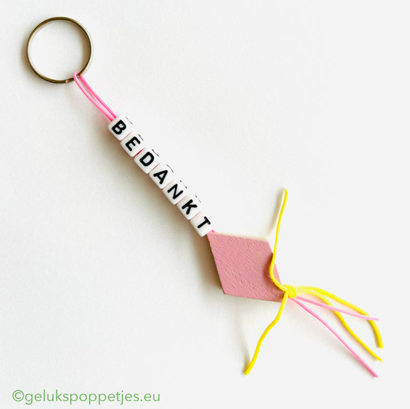 Sleutelhanger bedankt met gelukspoppetje spekje