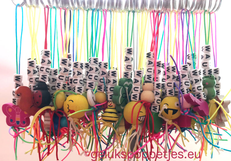 Sleutelhanger bedankt met verschillende gelukspoppetjes