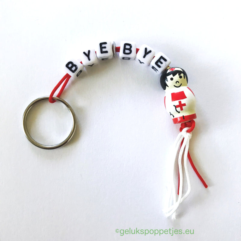 Sleutelhanger bye bye met gelukspoppetje vogel