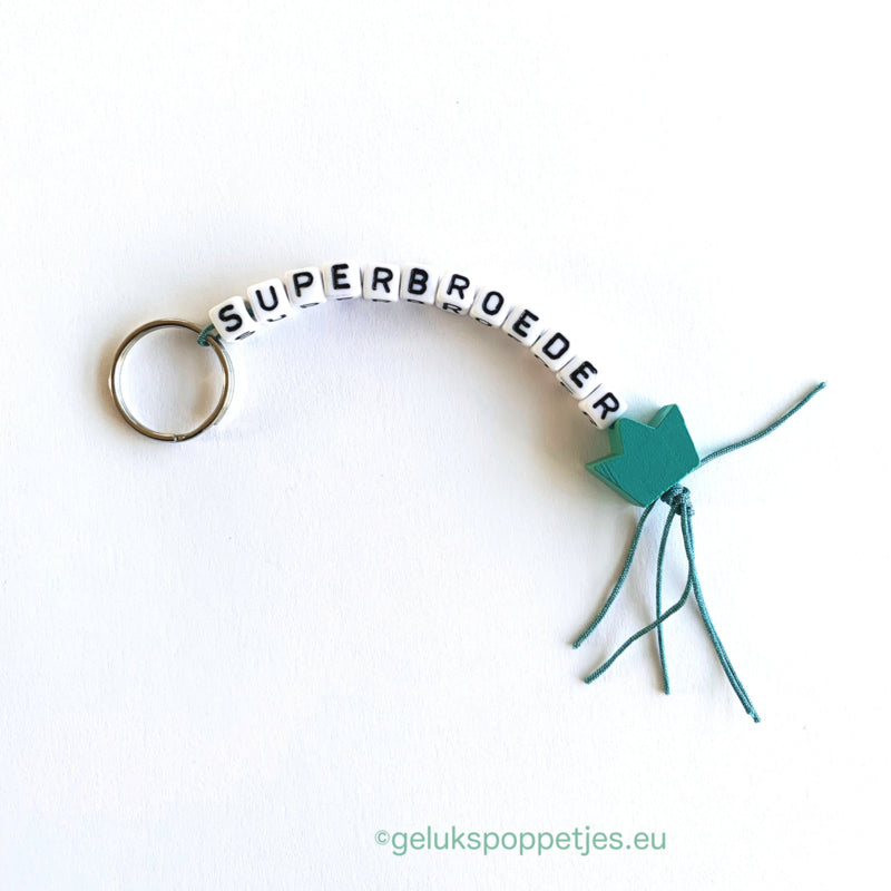 Sleutelhanger superbroeder met gelukspoppetje kroontje