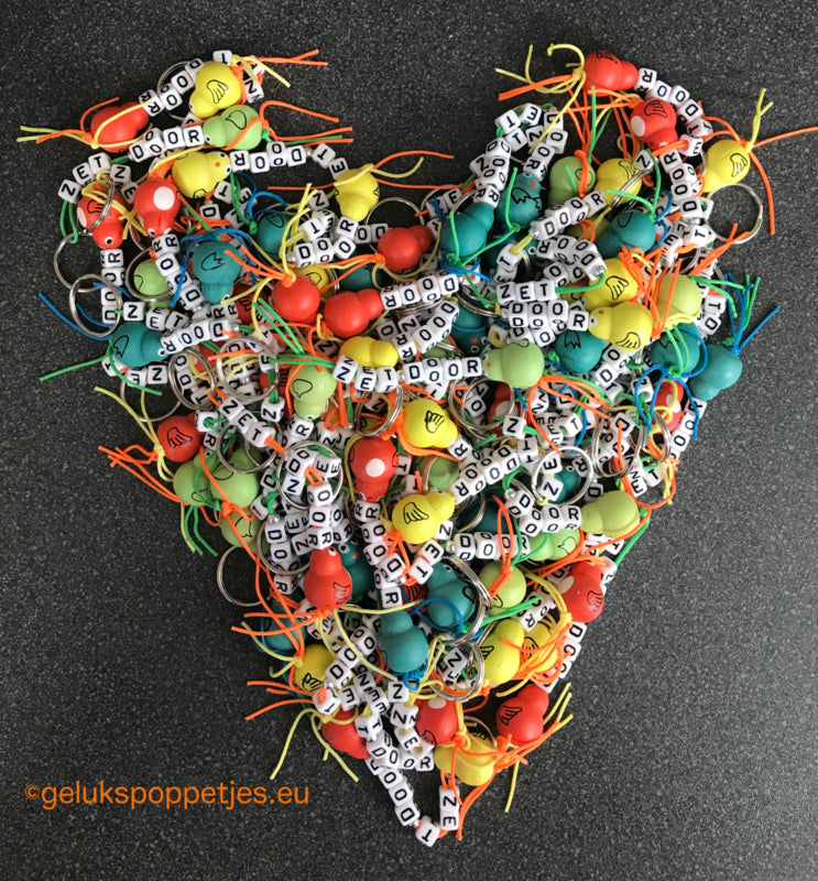 Sleutelhanger zet door met gelukspoppetje vogeltje