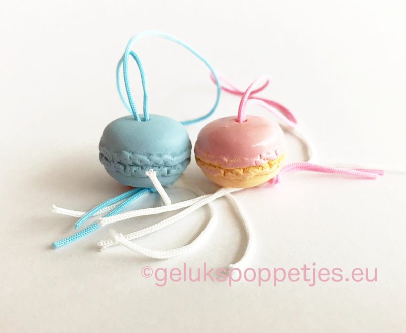Gelukspoppetje macarons roze en blauw