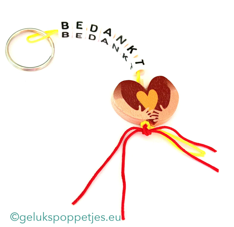 Sleutelhanger bedankt met gelukspoppetje omarm