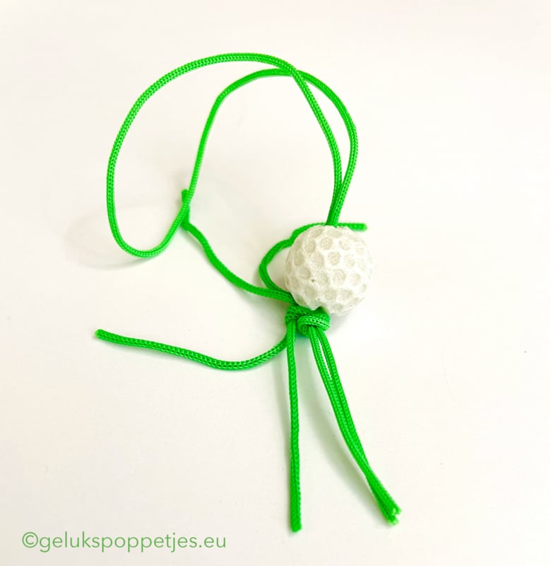 Gelukspoppetje golfbal
