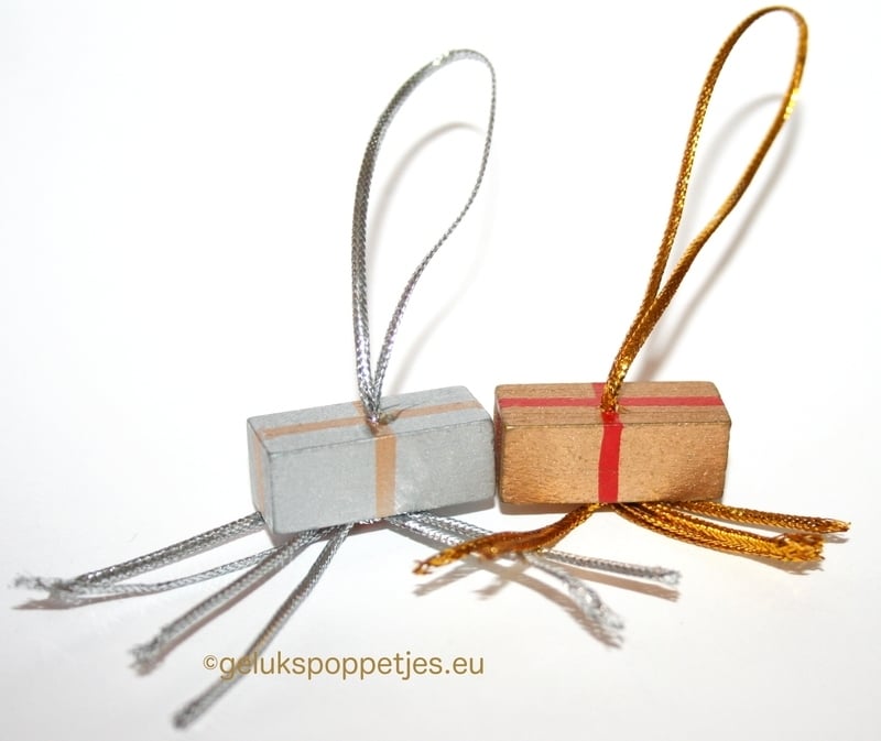 Gelukspoppetje cadeau goud en zilver