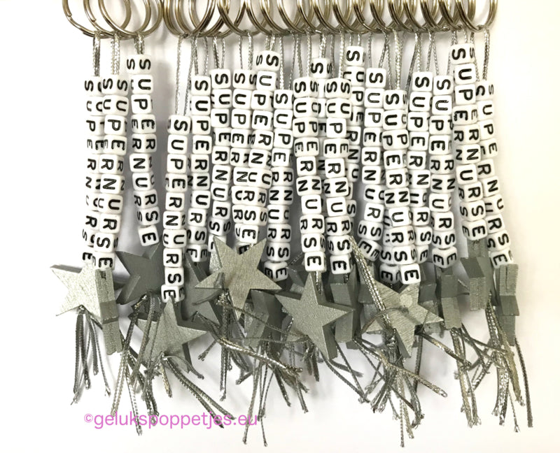 Sleutelhanger supernurse met gelukspoppetje verpleegster