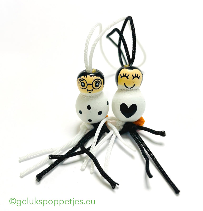 Gelukspoppetje met stipjes of hartje