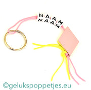 Naam sleutelhanger met gelukspoppetje spekje