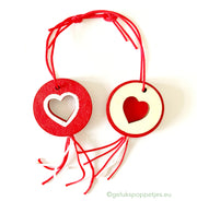 Gelukspoppetje met opengewerkt hartje