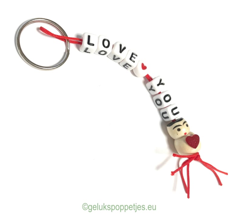 Sleutelhanger love❤️you met gelukspoppetje hartje op de buik