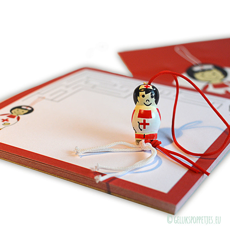 Gelukspoppetje verpleegkundige