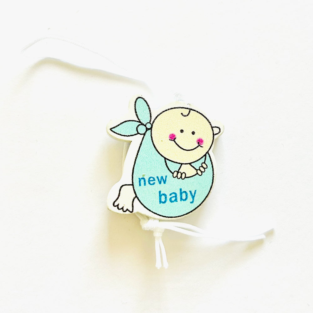 Gelukspoppetje baby jongen in doek