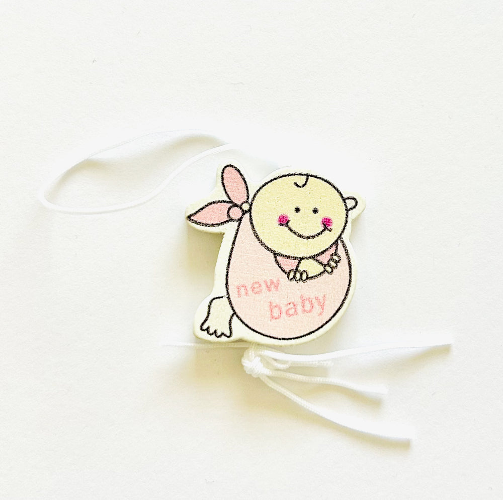 Gelukspoppetje baby meisje in doek