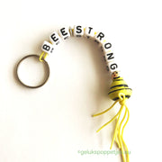 Sleutelhanger bee-strong met gelukspoppetje bijtje