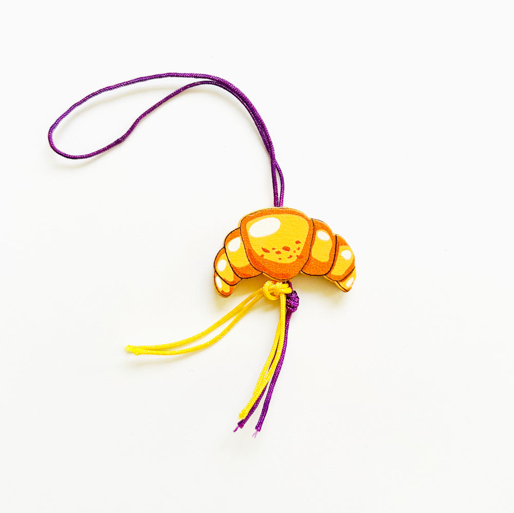Name keychain with croissant lucky charm