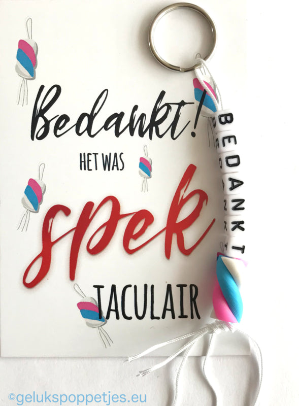 Sleutelhanger bedankt met gelukspoppetje gedraaid spekje