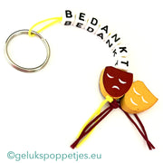 Bedankt sleutelhanger met gelukspoppetje theater masker