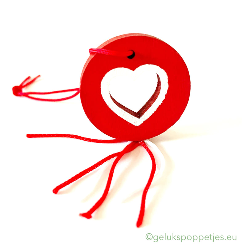 Gelukspoppetje met opengewerkt hartje