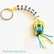 Sleutelhanger bedankt met gelukspoppetje kasteel