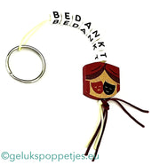 Sleutelhanger bedankt met gelukspoppetje theater
