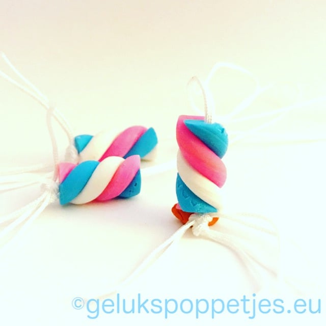 Gelukspoppetje gedraaid spekje