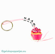 Naam sleutelhanger met gelukspoppetje cupcake roze