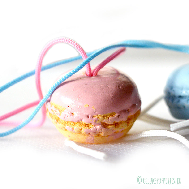 Gelukspoppetje macarons roze en blauw