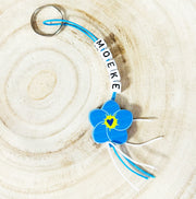 MOEKE keyring with forget-me-not lucky doll
